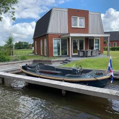 Holiday Home with private jetty on water