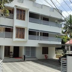 PAZHOOR RESIDENCY HOME STAY THREE BED ROOM Deluxe