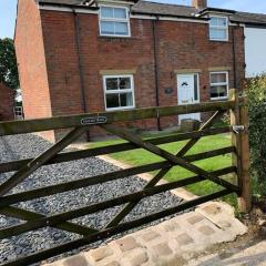 Newton Hall farm cottage with amazing views & hot tub