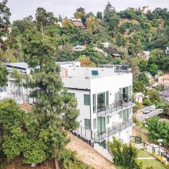 Luxury retreat with rooftop, hot tub & views