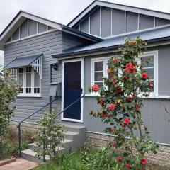 Rosellas on Corundum Cottage - treat yourself!