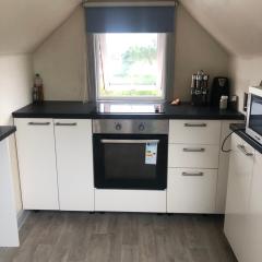 Room with shared kitchen