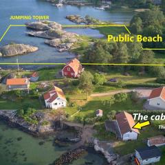 Cabin at the sea. public beach close with jumpingtower.