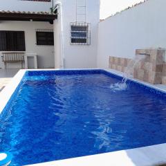 Casa na praia com Piscina e churrasqueira