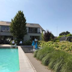 Vakantievilla met zwembad, wellness en glamping in Paal/Beringen