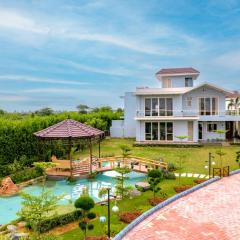 StayVista at Serenity Farms with Pool, Lawn, Bonfire & BBQ