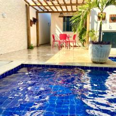 Linda Casa com piscina e totalmente climatizada Airbn b