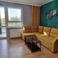 Nowy piękny apartament spokojna okolica, zielono, w poblizu basen, silownia, galerie, lotnisko 8 min