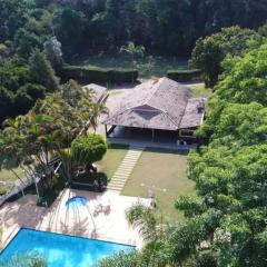 Casa Guacuri - Casa de temporada e eventos - apartamentos com suítes - Piscinas e Amplo Estacionamento