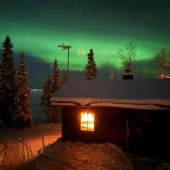 Northern Light Cabin with sauna by Torneriver