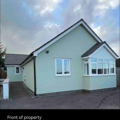 Green 3 bed bungalow with en-suite and parking