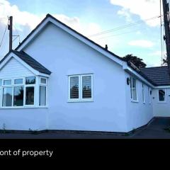 White 3 bed bungalow with en-suite and parking