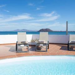 Corralejo Beachfront Villa Remos with Lobos Island View, Private Pool, Wifi & BBQ by Amazzzing Travel
