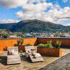 Leilighet i topp etasje med flott stor felles takterrasse