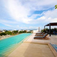 Apartment near the beach, rooftop, pool, sea view.