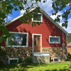 The Cozy Red Cabin