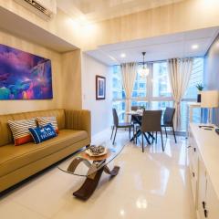 Spacious 2BR Apartment in BGC with Workspace & Washer