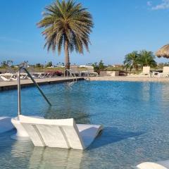 3 minutes from best beaches in Aruba! Luxury Tropical Townhouse at Gold Coast Aruba
