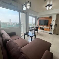 De Luxe and Studio Suites -The Breeze Residences-close to Airport,Mall of Asia, US Embassy