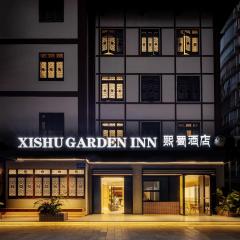 Xishu Garden Inn - Travel Agency service - Car Rent service - English Speaking