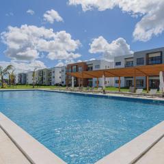 Apartamento vista a piscina, gym y cerca de playa