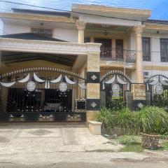 OYO 93502 Homestay Pakmuklis Syariah 2 Near Taman Mini Lhokseumawe