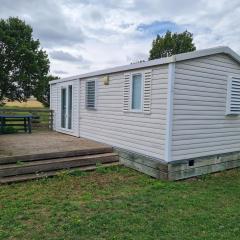 Mobil-home cosy avec terrasse près de l'étang de Parroy, idéal pour randonnées et activités nautiques - FR-1-584-305