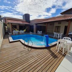 Casa agradável: piscina, churrasqueira e redário.