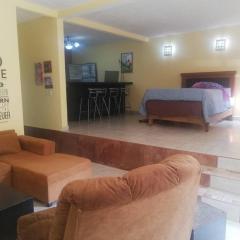 Suite equipada 2 camas mat, sala y cocina junto a Tec Santa Fe