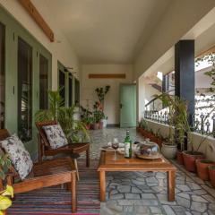 StayVista's Fiddle Leaf Home - Elegant Interiors, Spacious Lawn & Inviting Balcony