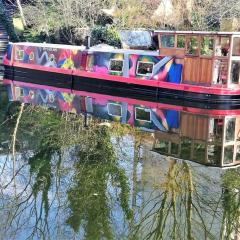 Slash Arts houseboat on secluded mooring in central London