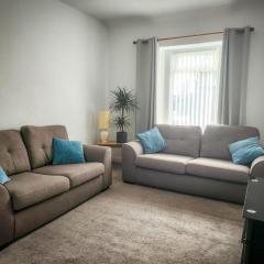 Central 2-bedroom bunglow with double sofa bed