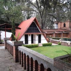 Cabaña de bosque con alberca