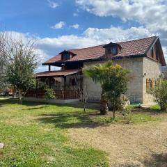 Detached stone house with access to a large garden near beach