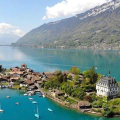 Romantic Swiss Alp Iseltwald with Lake & Mountains