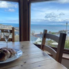 THE STONES a beautifully presented PRIVATE APARTMENT with far reaching VIEWS Over ST IVES HARBOUR and BAY and FREE ONSITE PARKING for LARGER GROUPS book along with our Connecting TWO SISTER APARTMENTS