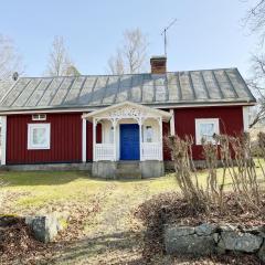 Small red cottage located close to forest outside Virserum