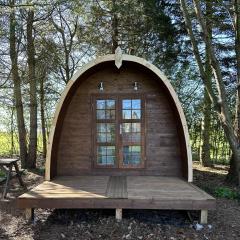 Woodland camping pod with use of campsite bathroom