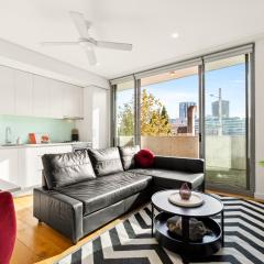 Central, modern 1 bedroom with air-con & balcony
