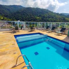 Apartamentos a 200m praia das Toninhas - Condomínio Vista Verde | Piscina na Cobertura com vista Espetacular