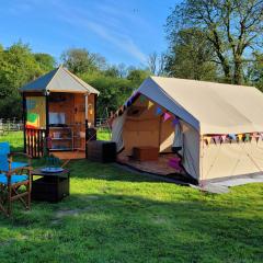 Unique Rental Tents Choose from a Bell, Cabin, Yurt Tent or An individual Bell Tent with private facilities All with Kitchenettes & Comfy beds NO BEDDING SUPPLIED