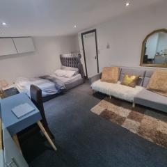 A Cosy Deluxe Size Studio With Queen size and Sofa Bed
