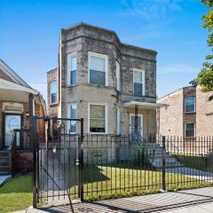 Newly rehabbed Greystone with 2 private apartments, backyard, garage, laundry, close to expressway