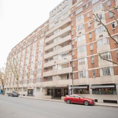 One bedroom at Chelsea cloister Hotel