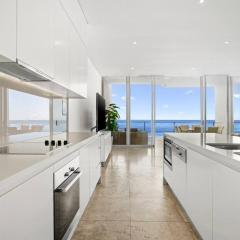 Beachside Luxury Penthouse with Breathtaking Views and Private Rooftop Terrace