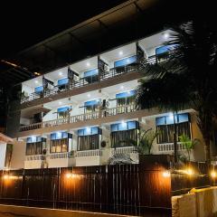 Hotel pleasure inn near turtle beach morjim Manage by ld group of hospitality
