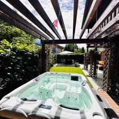 The Swiss Paradise 2 Apartment with Garden, Whirlpool, and Mountain Panorama