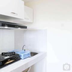 Modern and Homey 2BR at Puncak Kertajaya Apartment By Travelio