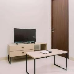Comfort and Homey 2BR at Transpark Bintaro Apartment By Travelio
