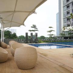 Well Design and Homey 1BR Ciputra International Apartment By Travelio